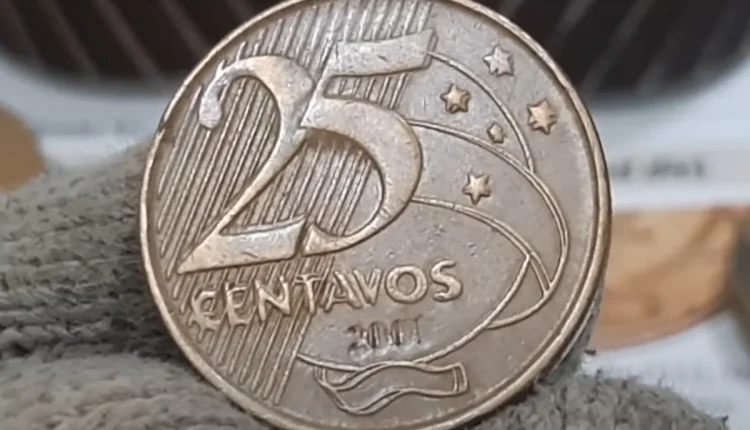 Moeda 25 centavos ombro duplo